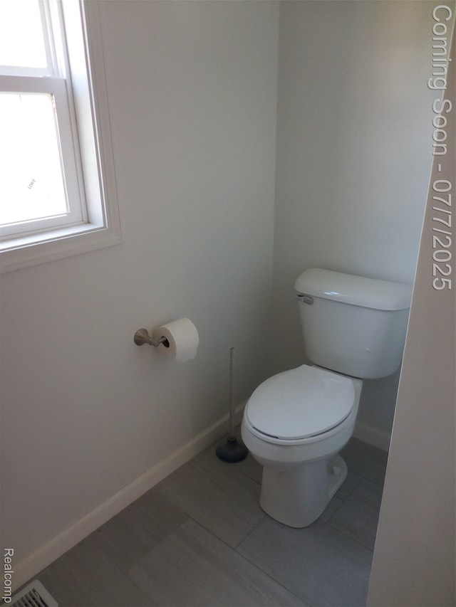501 N Leroy St, Fenton, MI 48430 - bathroom with toilet and baseboards
