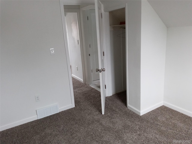501 N Leroy St, Fenton, MI 48430 - unfurnished bedroom with carpet, a closet, and a spacious closet