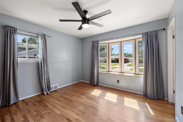 26250 Virginia Dr, Warren, MI 48091 - empty room with light wood-type flooring and ceiling fan