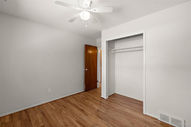 26250 Virginia Dr, Warren, MI 48091 - unfurnished bedroom with wood finished floors, a closet, and ceiling fan