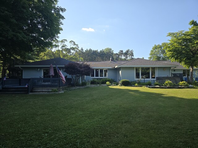 971 Weaver Rd, Bronson, MI 49028 - ranch-style house featuring a front yard and a wooden deck