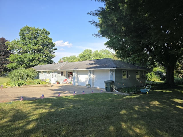 971 Weaver Rd, Bronson, MI 49028 - view of front of home with a garage and a front yard