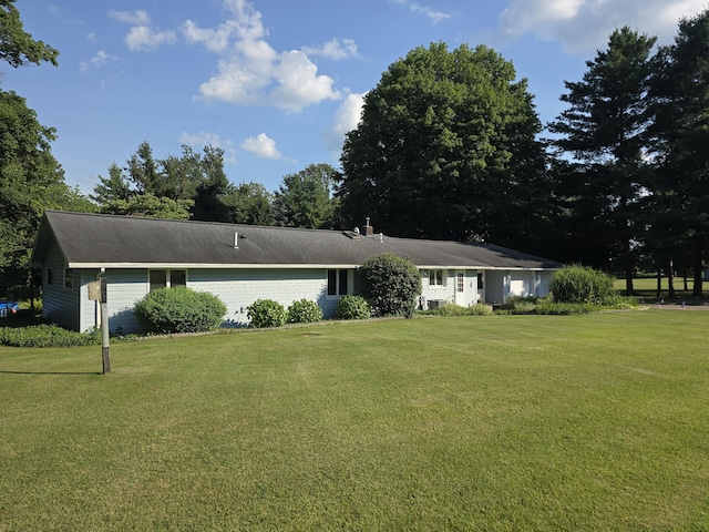 971 Weaver Rd, Bronson, MI 49028 - ranch-style house with a front lawn and a chimney