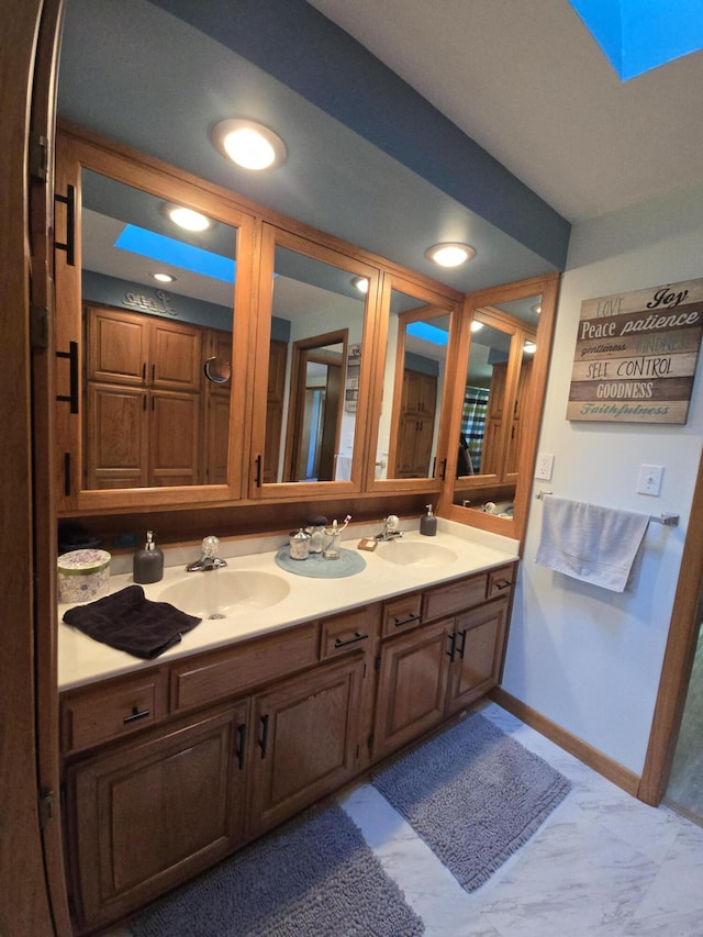 971 Weaver Rd, Bronson, MI 49028 - bathroom featuring double vanity and recessed lighting