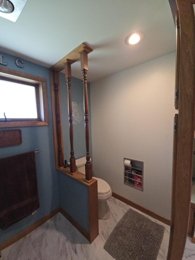 971 Weaver Rd, Bronson, MI 49028 - bathroom featuring toilet and marble finish floors