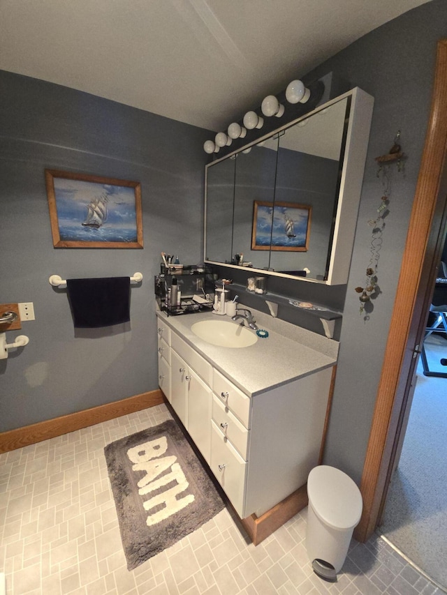 971 Weaver Rd, Bronson, MI 49028 - bathroom featuring vanity and baseboards