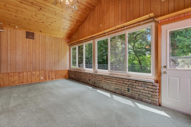 1834 Bond St, Niles, MI 49120 - unfurnished sunroom featuring wood walls, lofted ceiling, wooden ceiling, and carpet floors