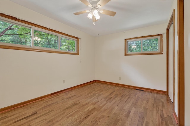 1834 Bond St, Niles, MI 49120 - spare room featuring plenty of natural light, light wood-style flooring, and a ceiling fan