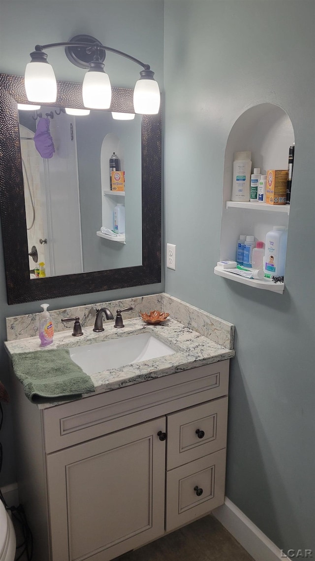 401 Budlong St, Adrian, MI 49221 - bathroom with vanity and toilet
