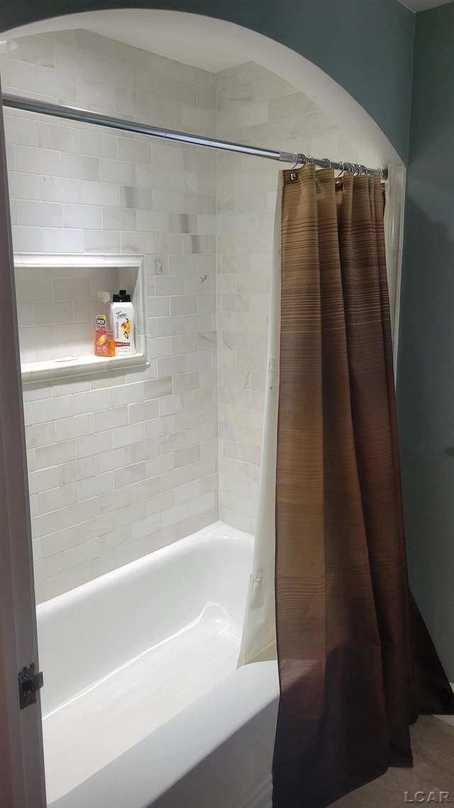 401 Budlong St, Adrian, MI 49221 - bathroom with shower / tub combo with curtain