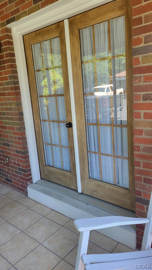 401 Budlong St, Adrian, MI 49221 - view of exterior entry with brick siding