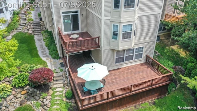 5348 Forest Ridge Dr, Clarkston, MI 48346 - rear view of property with a balcony and a deck
