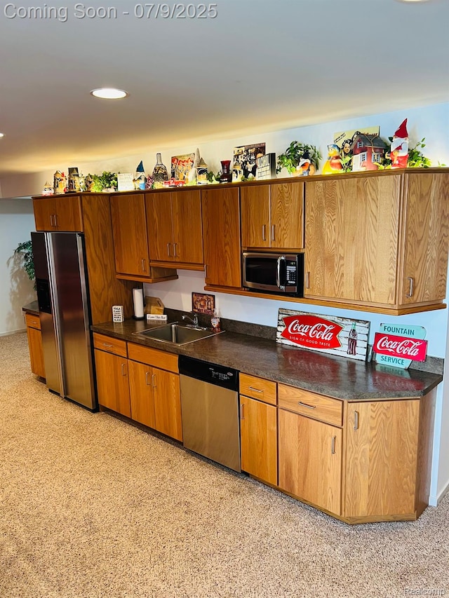 5348 Forest Ridge Dr, Clarkston, MI 48346 - kitchen with appliances with stainless steel finishes, dark countertops, brown cabinets, and recessed lighting