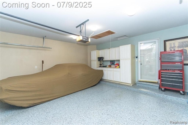 5348 Forest Ridge Dr, Clarkston, MI 48346 - garage featuring a garage door opener