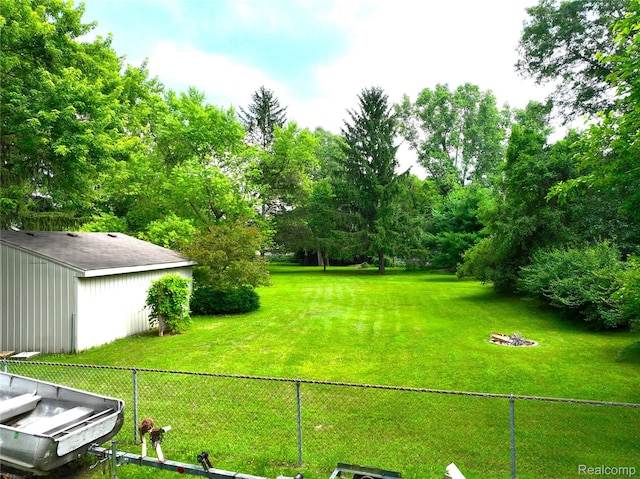 9100 Mayfred Dr, Pinckney, MI 48169 - view of yard featuring view of wooded area