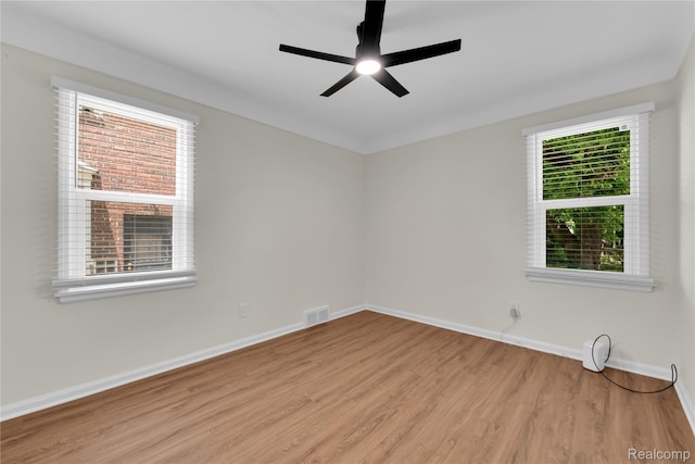 3992 Devonshire Rd, Detroit, MI 48224 - spare room with light wood-style flooring and a ceiling fan