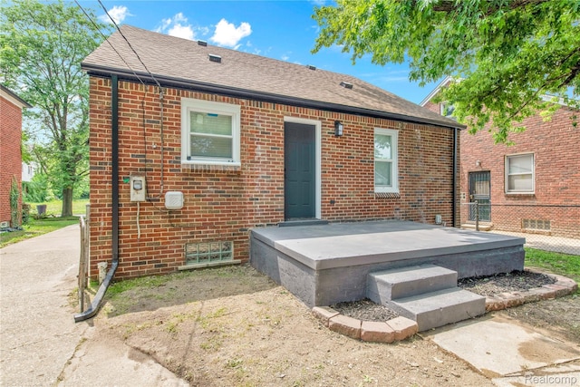 3992 Devonshire Rd, Detroit, MI 48224 - back of property with brick siding and roof with shingles