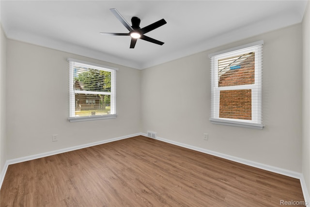 3992 Devonshire Rd, Detroit, MI 48224 - empty room featuring wood finished floors and a ceiling fan