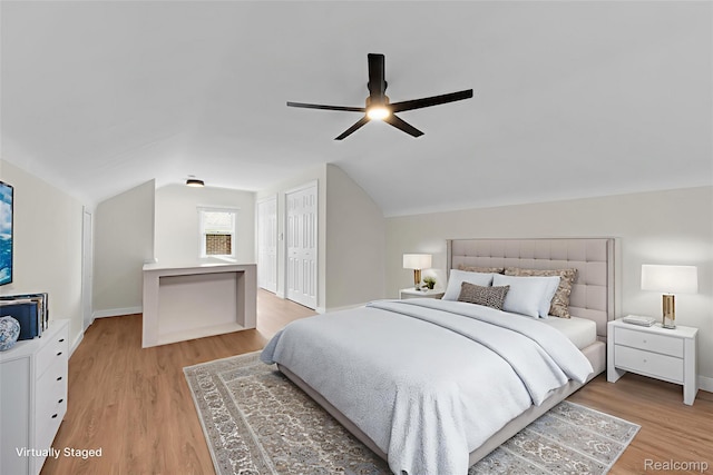 3992 Devonshire Rd, Detroit, MI 48224 - bedroom featuring light wood-style flooring, vaulted ceiling, and ceiling fan
