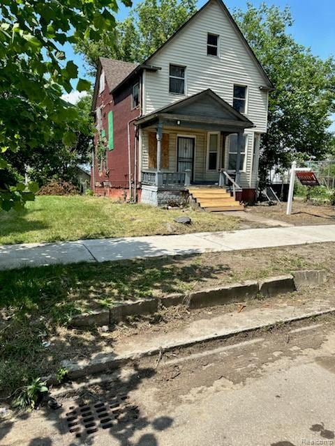 661 Melbourne St, Detroit, MI 48202 - view of front of house featuring a porch