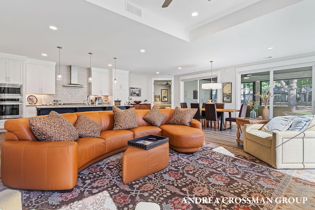 2063 Ottawa Beach Rd, Holland, MI 49424 - living room featuring recessed lighting, ceiling fan, and light wood-style floors