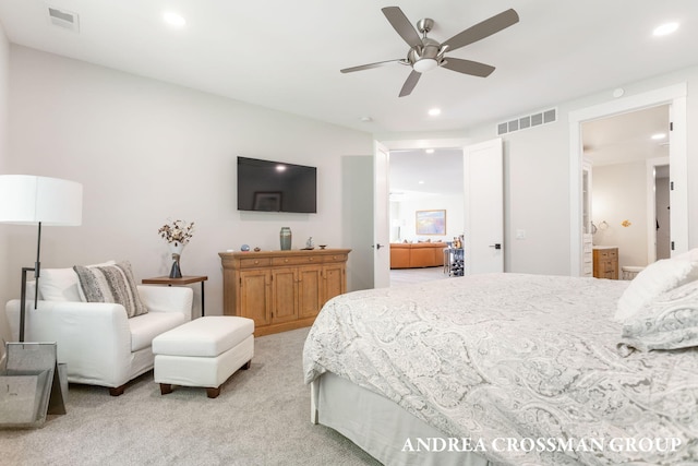 2063 Ottawa Beach Rd, Holland, MI 49424 - bedroom with recessed lighting, light colored carpet, ensuite bathroom, and ceiling fan