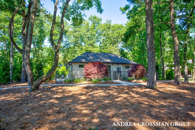 2063 Ottawa Beach Rd, Holland, MI 49424 - view of front of house with a gate