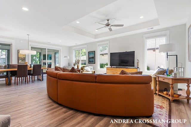 2063 Ottawa Beach Rd, Holland, MI 49424 - living area with a raised ceiling, light wood finished floors, healthy amount of natural light, and recessed lighting