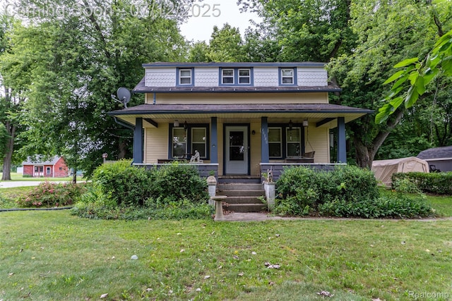 16380 Sumpter Rd, Van Buren, MI 48111 - view of front of house featuring a front lawn, a porch, and mansard roof