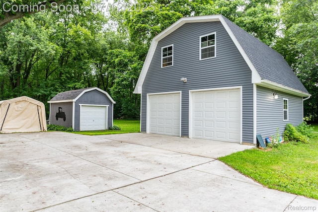 16380 Sumpter Rd, Van Buren, MI 48111 - garage with a garage and view of scattered trees