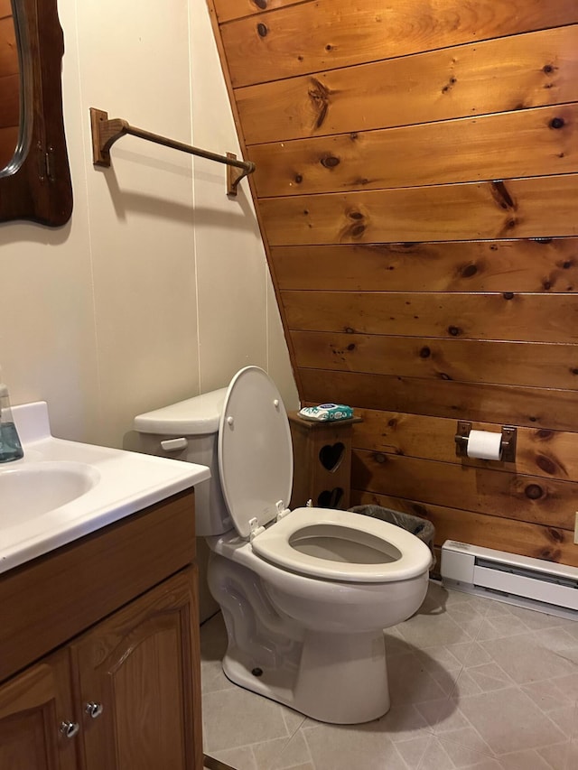 3423 S James Rd, Baldwin, MI 49304 - half bathroom featuring a baseboard heating unit and vanity