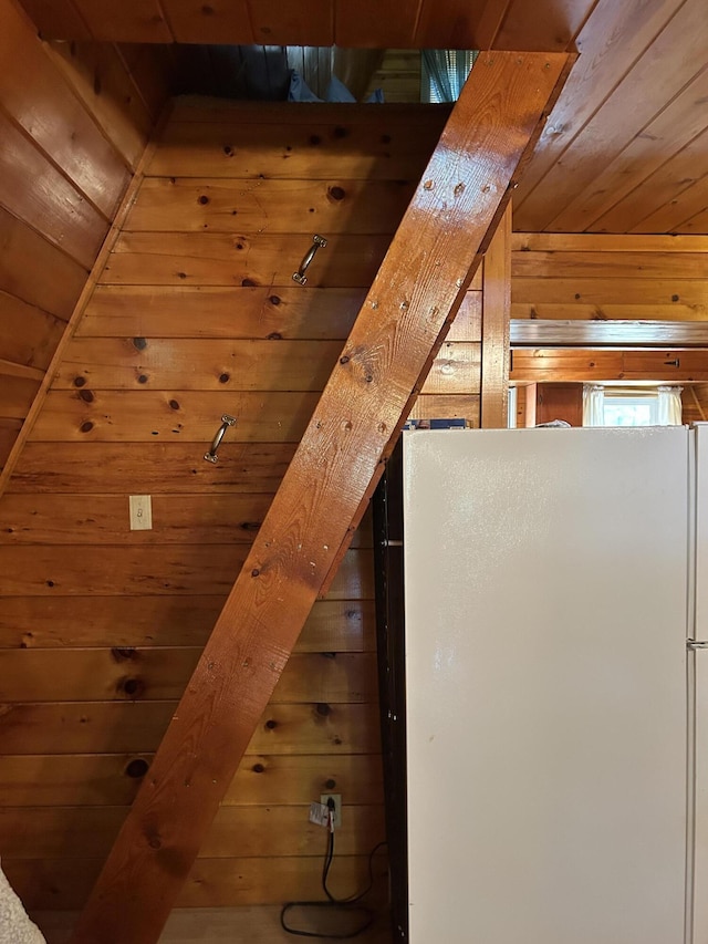 3423 S James Rd, Baldwin, MI 49304 - stairway with wooden ceiling and wooden walls