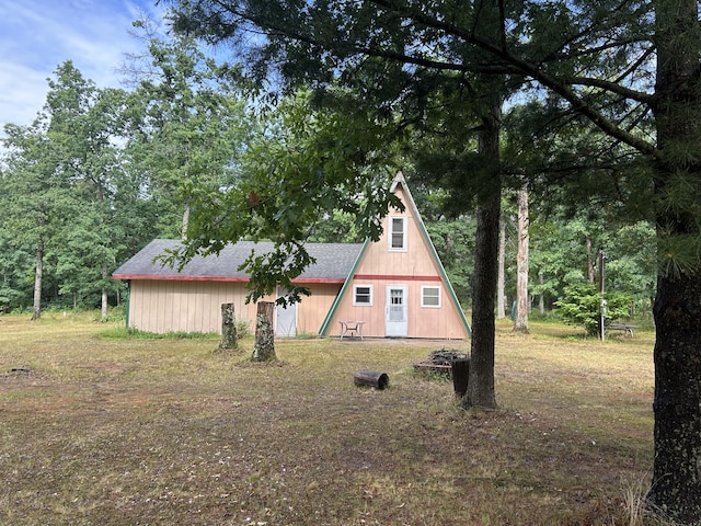 3423 S James Rd, Baldwin, MI 49304 - view of front of property featuring roof with shingles