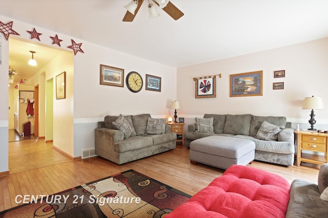 3405 S Miller Rd, Saginaw, MI 48609 - living area featuring hardwood / wood-style floors and ceiling fan