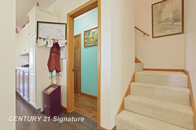 3405 S Miller Rd, Saginaw, MI 48609 - staircase featuring wood finished floors