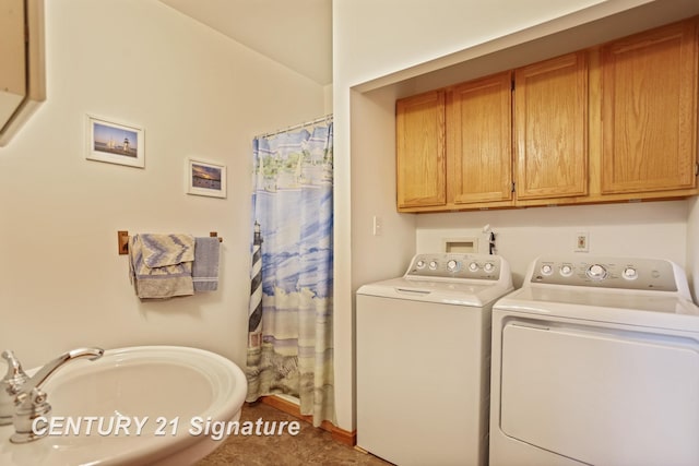 3405 S Miller Rd, Saginaw, MI 48609 - laundry room featuring washing machine and clothes dryer and tile patterned flooring