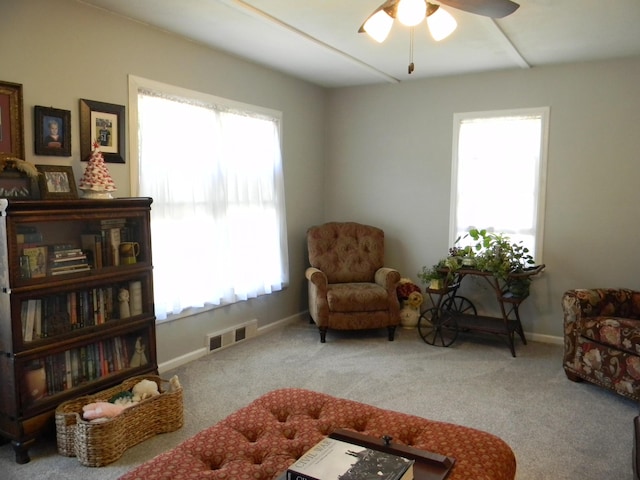 103 S Staffon St, Ludington, MI 49431 - living area featuring carpet and ceiling fan
