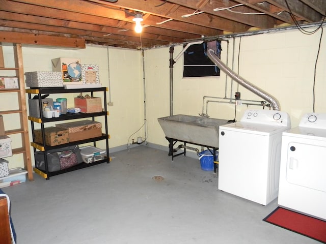 103 S Staffon St, Ludington, MI 49431 - unfinished basement with independent washer and dryer and concrete block wall