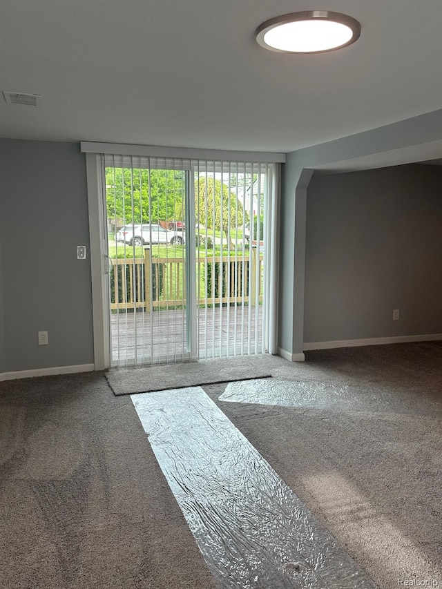 17788 Quarry St, Riverview, MI 48193 - spare room featuring carpet floors and plenty of natural light