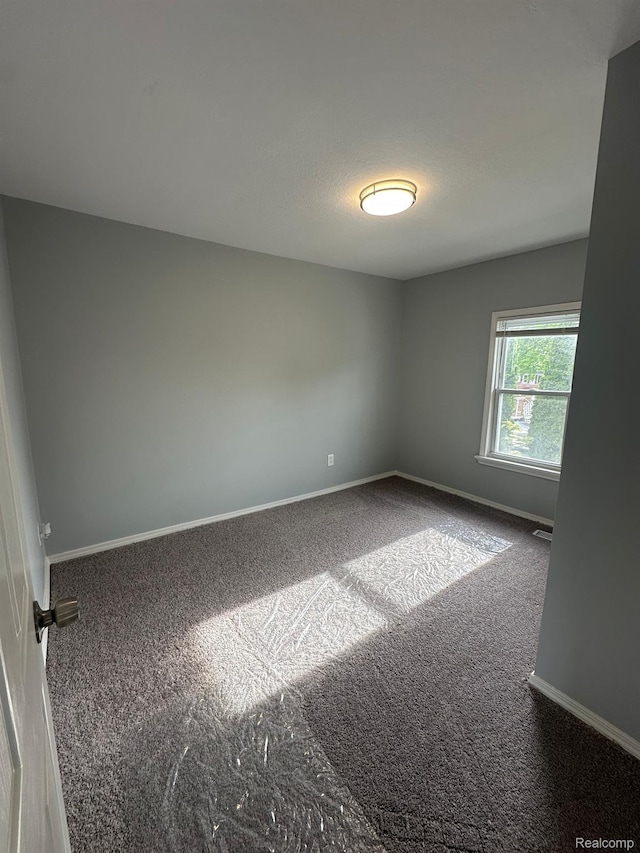 17788 Quarry St, Riverview, MI 48193 - carpeted spare room with baseboards