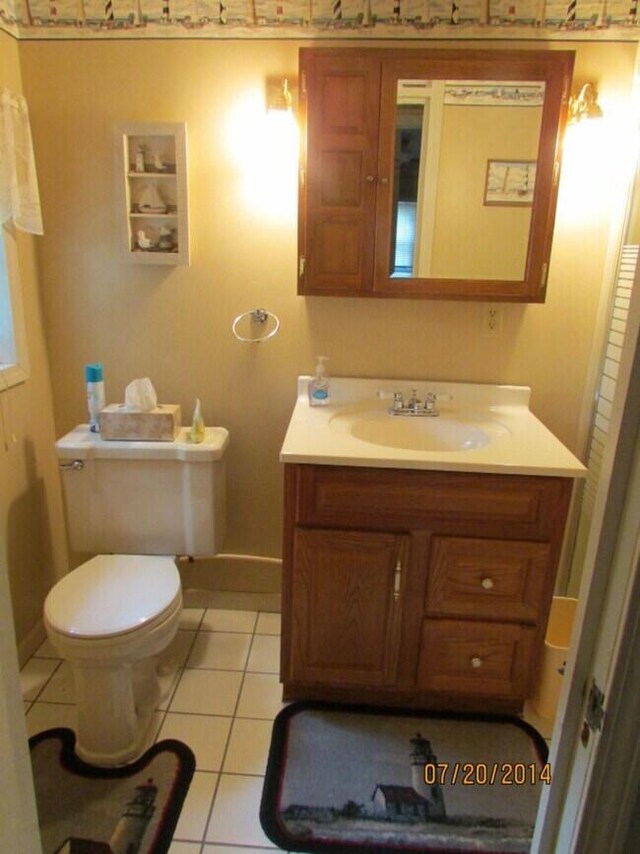777 W Lincoln Ave, White Cloud, MI 49349 - bathroom featuring vanity and tile patterned flooring