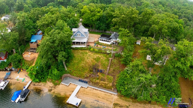 777 W Lincoln Ave, White Cloud, MI 49349 - aerial view of a nearby body of water and a heavily wooded area