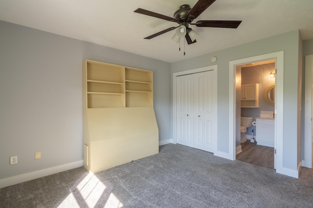 10068 S Crossroads Cir SE, Caledonia, MI 49316 - unfurnished bedroom featuring carpet, a closet, connected bathroom, and a ceiling fan