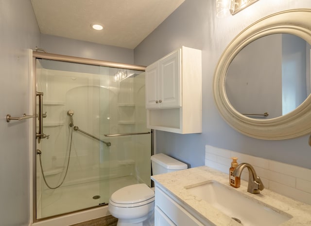 10068 S Crossroads Cir SE, Caledonia, MI 49316 - full bath with a stall shower, vanity, backsplash, and recessed lighting