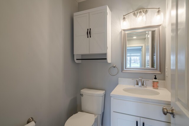 10068 S Crossroads Cir SE, Caledonia, MI 49316 - bathroom featuring toilet and vanity