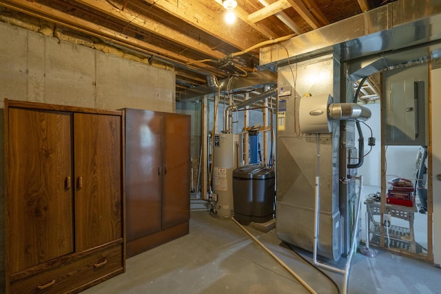 10068 S Crossroads Cir SE, Caledonia, MI 49316 - unfinished below grade area featuring water heater, electric panel, and heating unit