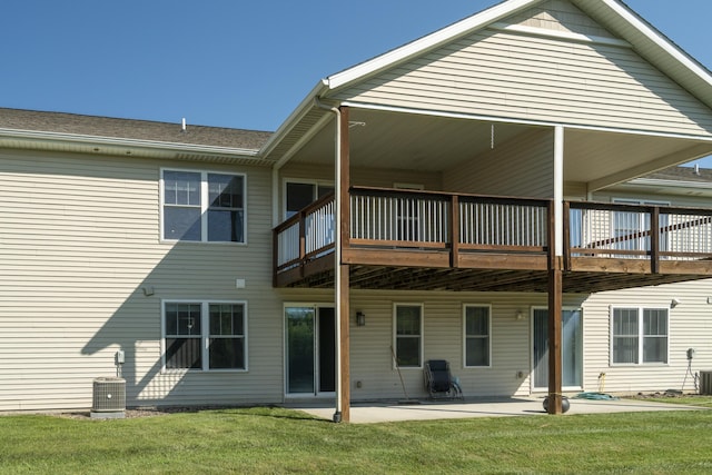 10068 S Crossroads Cir SE, Caledonia, MI 49316 - rear view of property with a lawn, a patio, and a deck