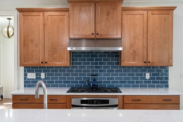 8375 Grapevine Circle, Cir, MI 49071 - kitchen featuring exhaust hood, wall oven, black gas stovetop, backsplash, and brown cabinetry