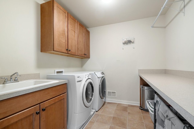 8375 Grapevine Circle, Cir, MI 49071 - laundry room featuring separate washer and dryer and cabinet space