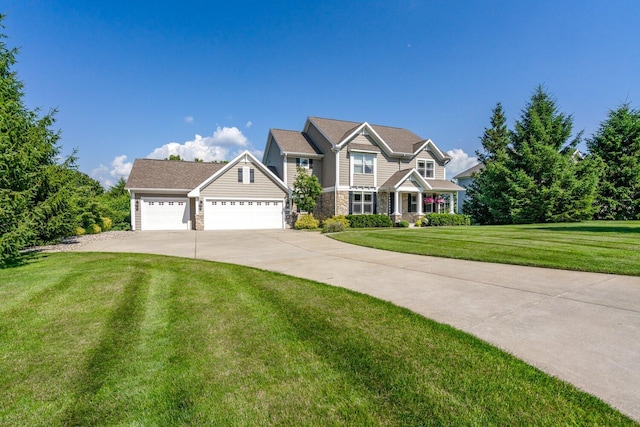 8375 Grapevine Circle, Cir, MI 49071 - craftsman-style house featuring stone siding, driveway, a front yard, and a garage